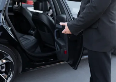 Taxi Driver opening taxi door